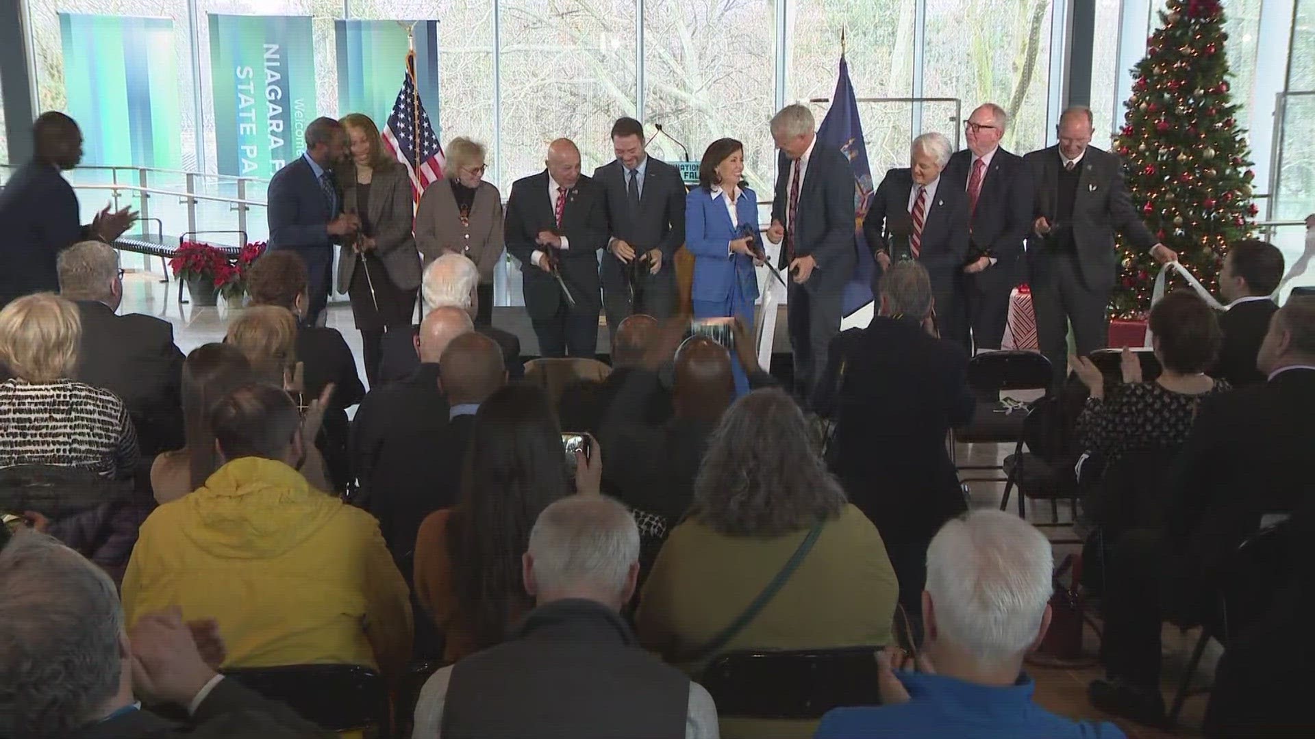 Governor Kathy Hochul cuts the ribbon at the new Niagara Falls State Park 'Ralph C. Wilson Welcome Center'