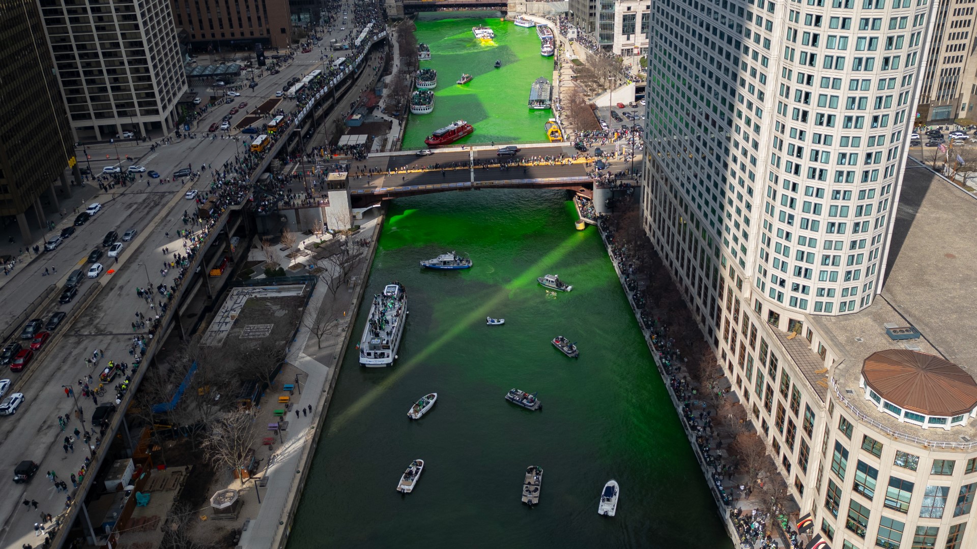 In one of Chicago's most recognizable and iconic traditions, crews used boats to dye the Chicago River a gorgeous shade of green.