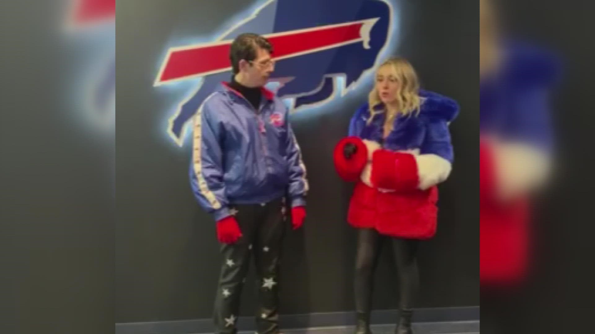 Joshua Vacanti and Cami Clune rehearse the national anthem ahead of the Bills playoff game.