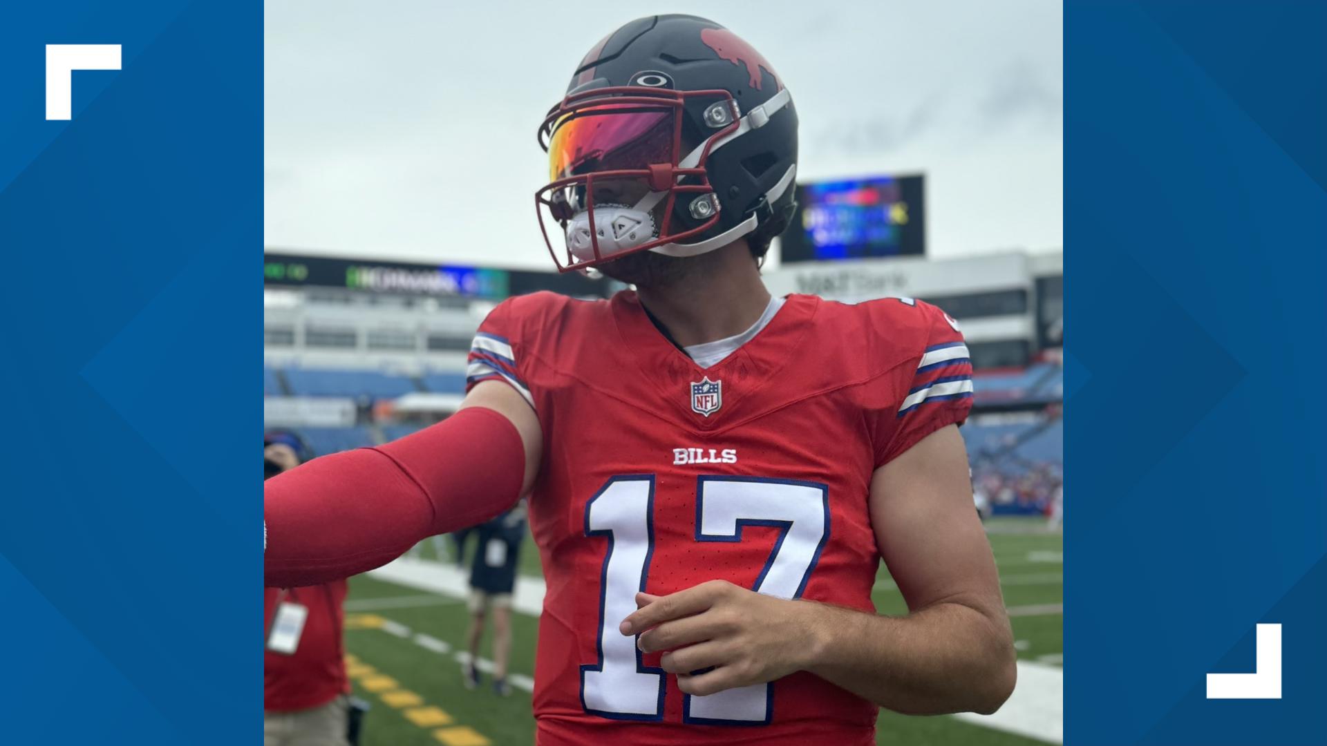 Josh Allen wore a black helmet, with a classic red Bills logo and a single red stripe down the middle, at Friday's Blue and Red practice.