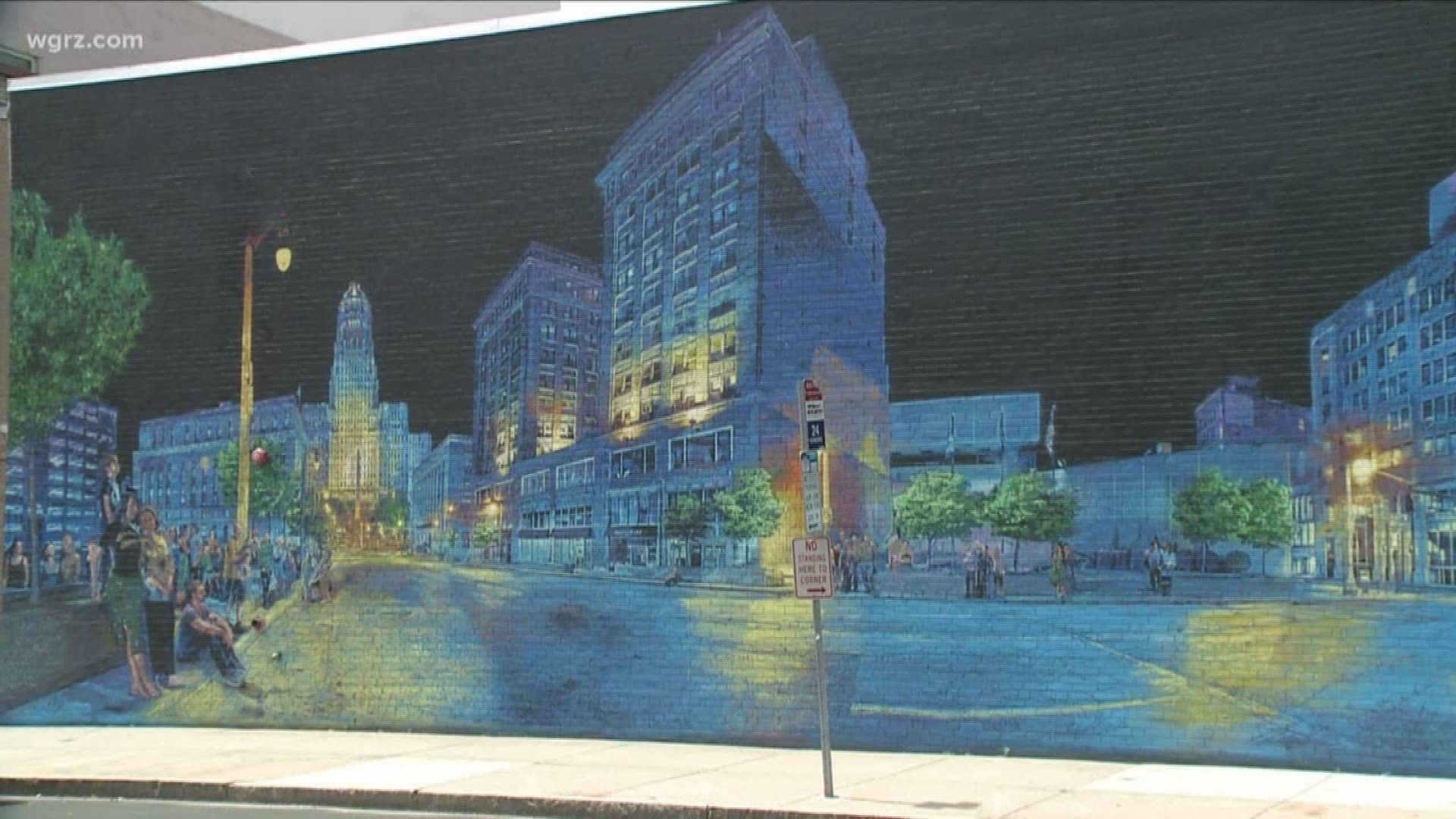 The mural here is called "Walking Back Time" and it's at the corner of East Huron and Washington downtown.