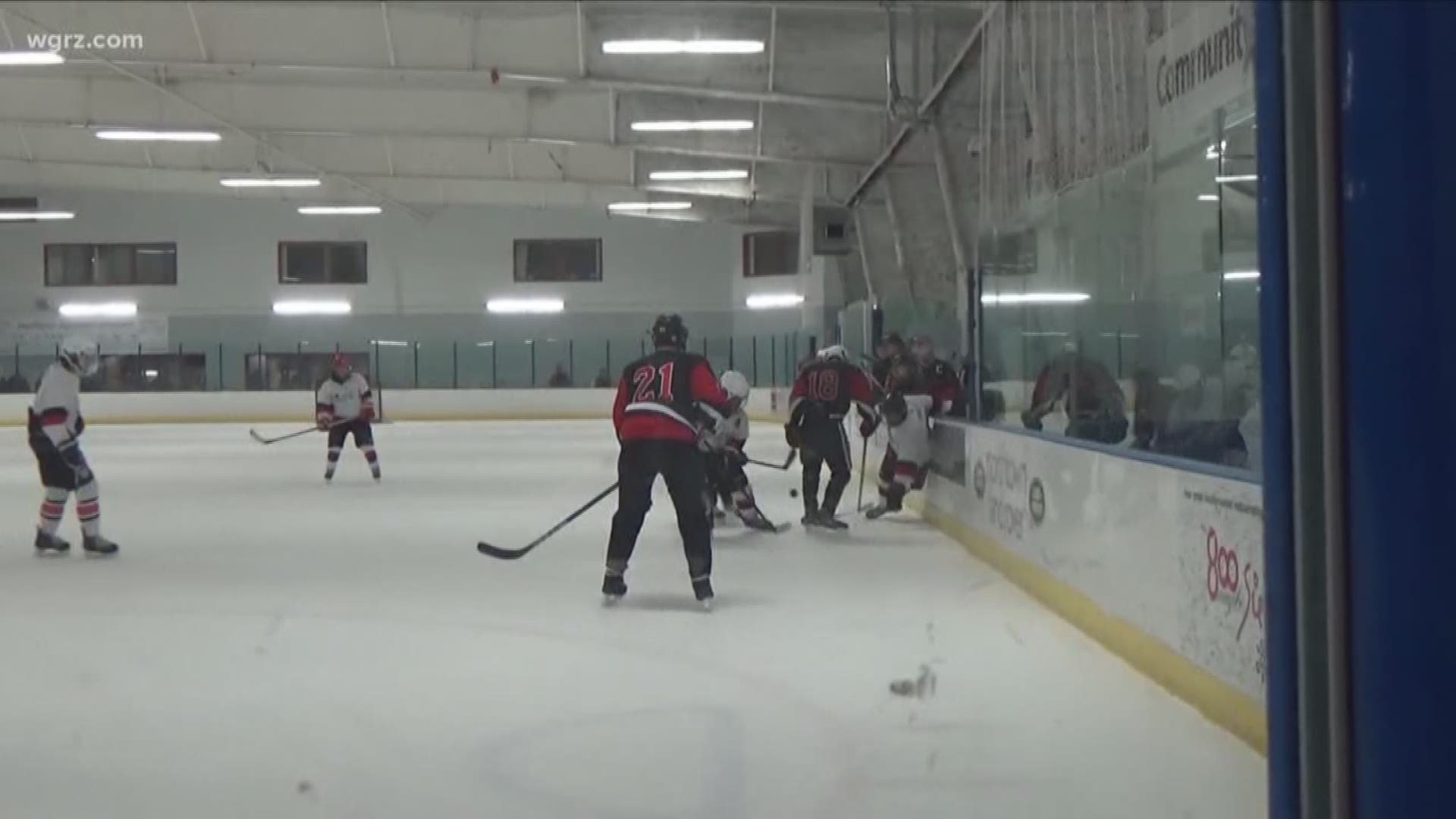 Hockey players and assistant coach suspended after racist remarks