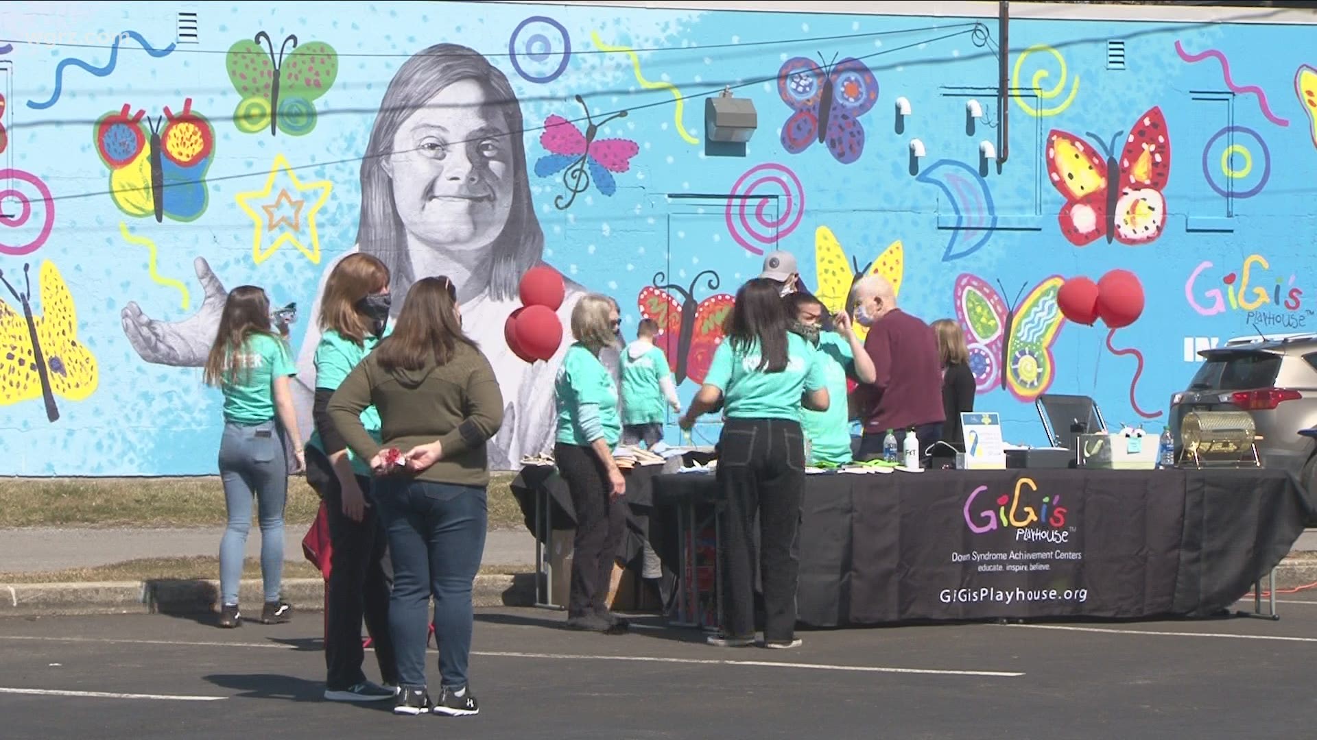 The group Gigi's Playhouse held a parking lot party today for family and friends of people with down syndrome.