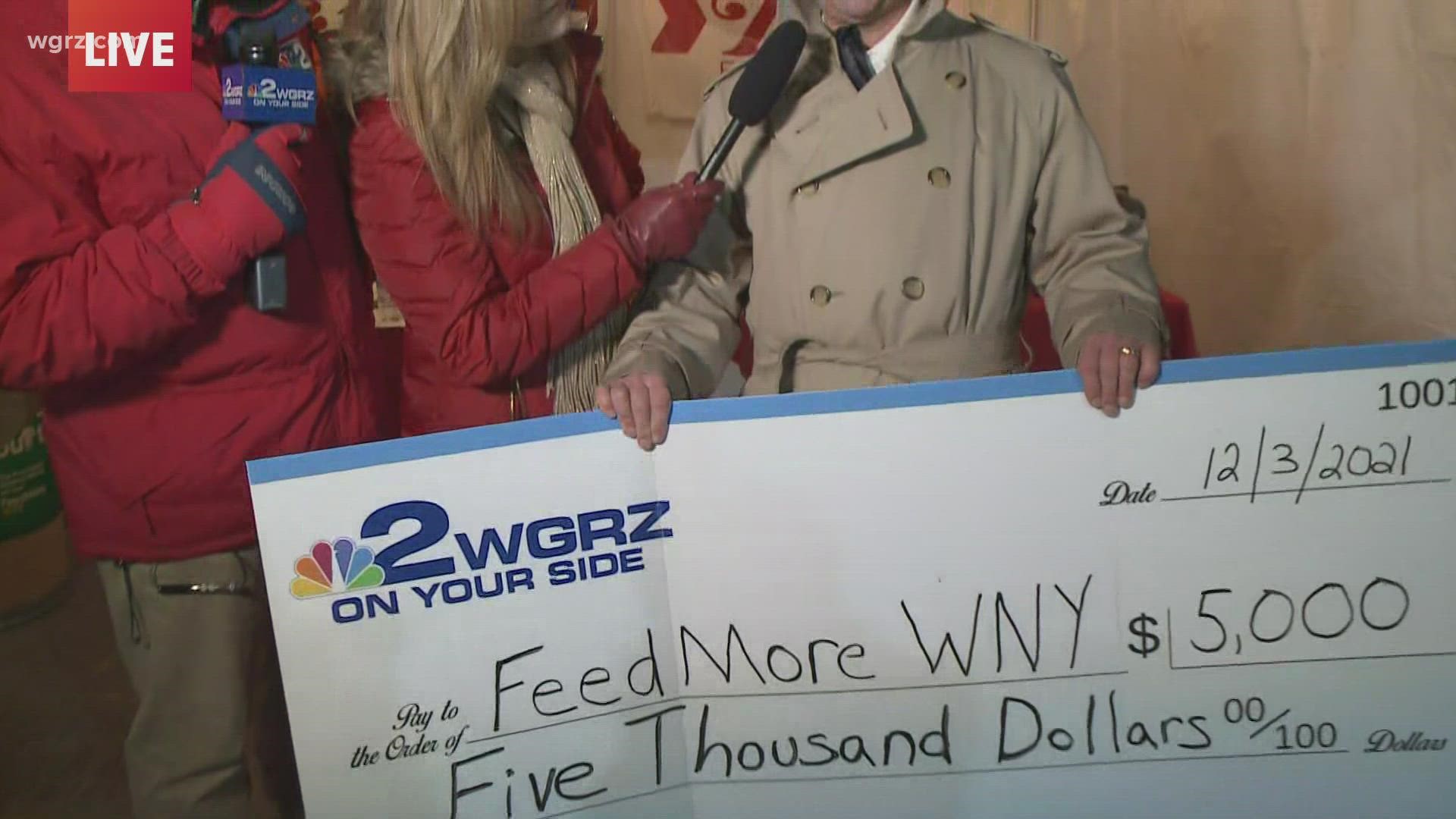 Channel 2 General Manager Jim Toellner Presents a $5000.00 check to Feedmore  WNY