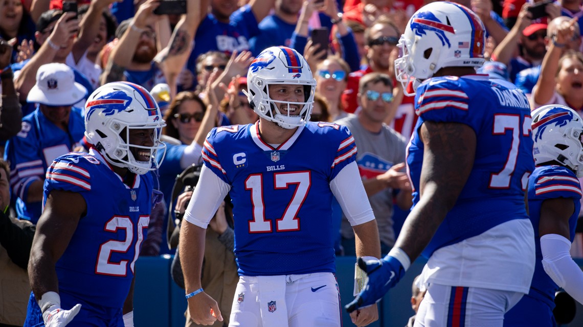 Buffalo Bills running back Zack Moss (20) celebrates with tackle