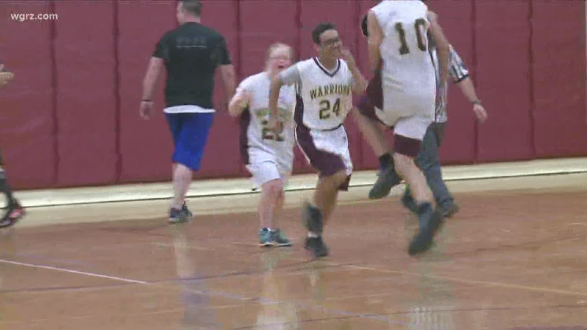 The iroquois high school unified sports basketball team will receive the state's *first ever* unified champion schools banner... tomorrow afternoon.