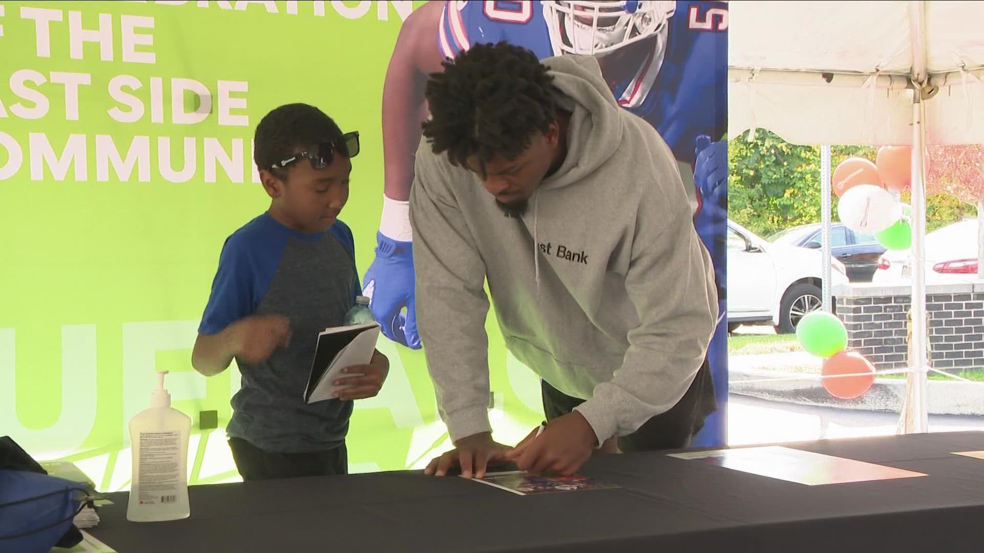 Bills player Gregory Rousseau makes visit to Buffalo's East Side