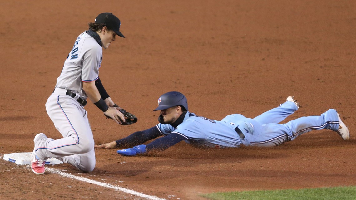 Blue Jays win Buffalo home opener, topping Marlins in extra innings