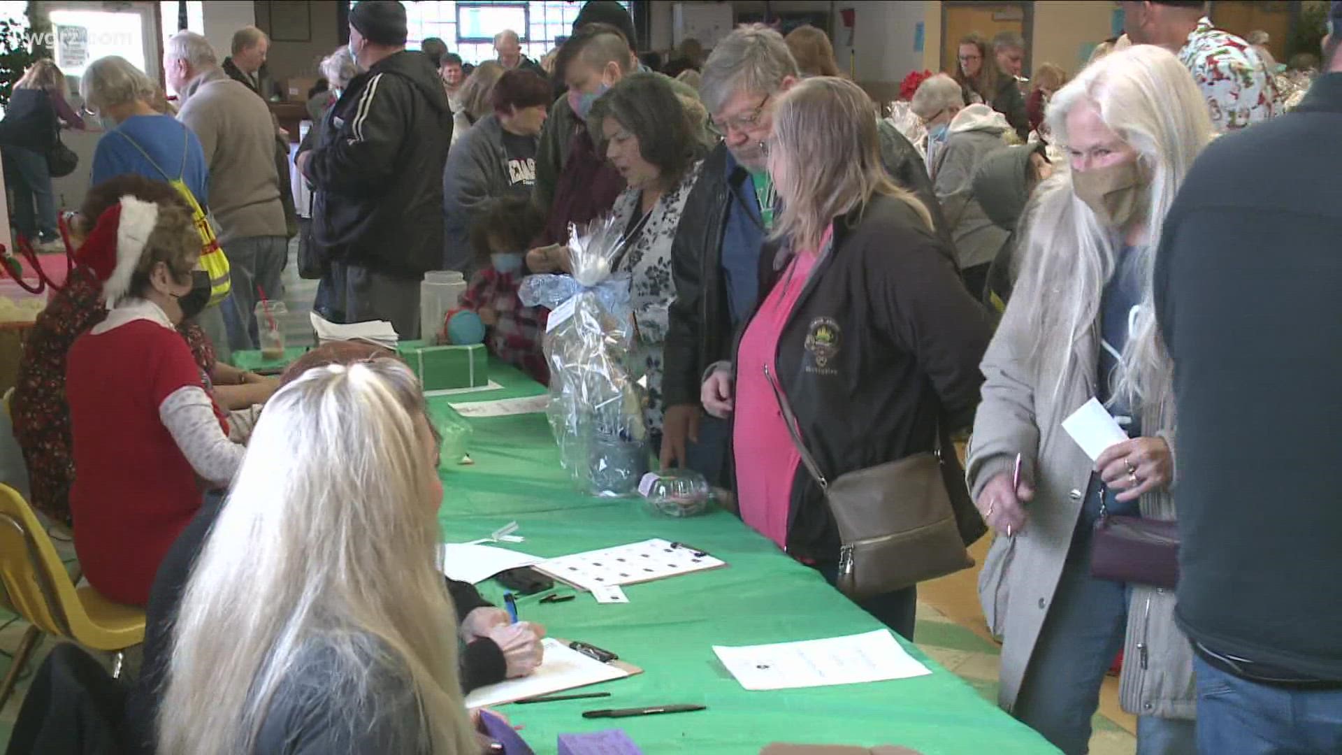 Our camera stopped by a popular holiday celebration today. All of the money raised will help with the building of a five acre senior dog sanctuary.