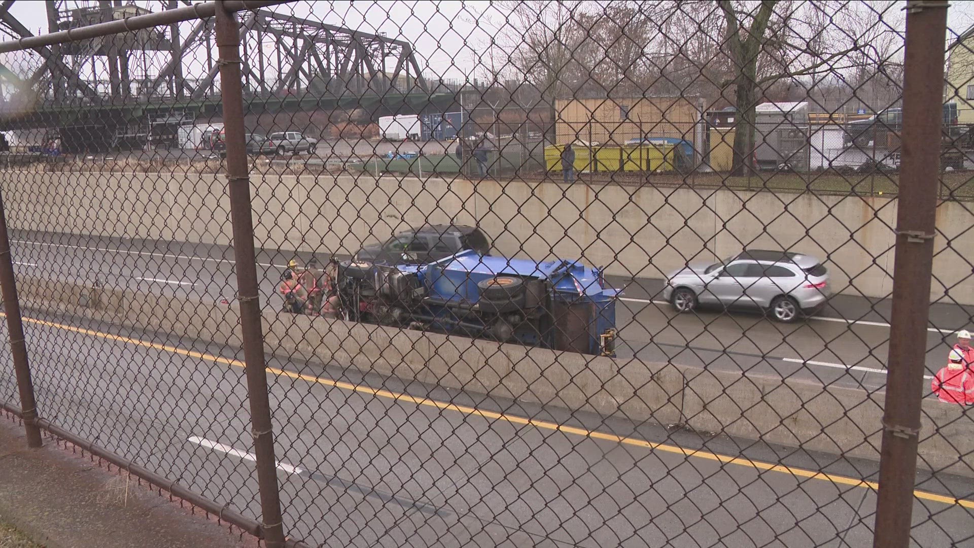 A garbage truck somehow flipped over on its side on the 190 south near Exit 14, that's Ontario Street. This happened around 9 this morning.