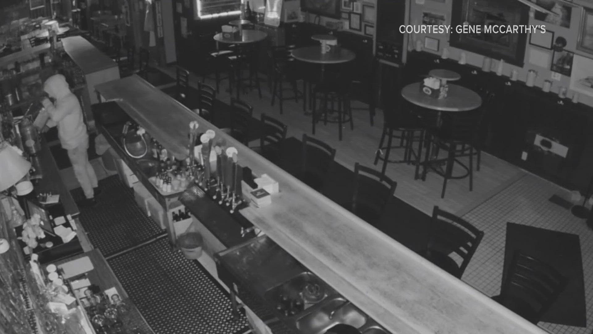 THESE PHOTOS ON YOUR SCREEN, TAKEN FROM SECURITY FOOTAGE INSIDE THE BAR, SHOW THE MOMENTS THE SUSPECT BROKE IN