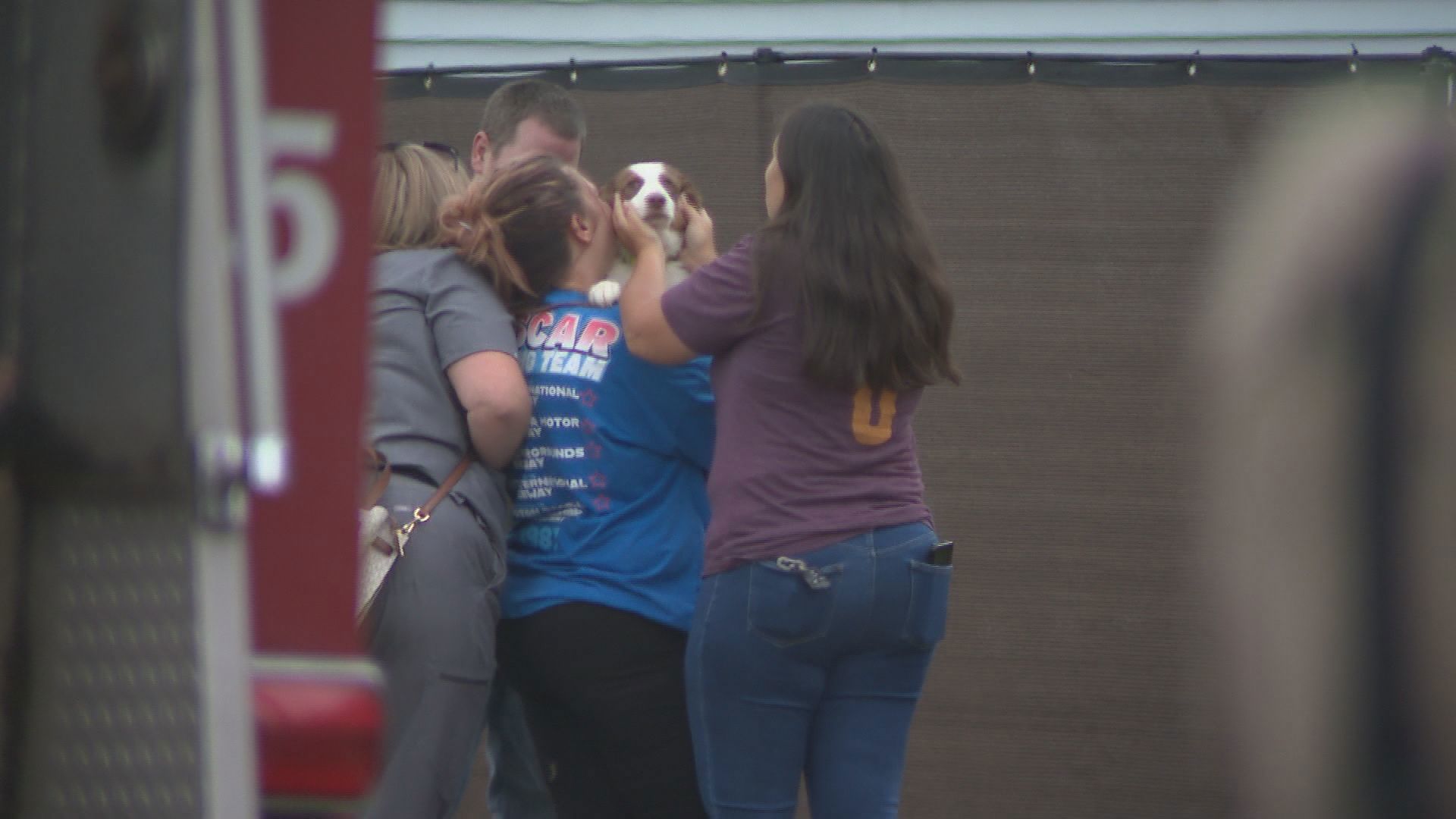 A dog rescued from a house fire was reunited with its owners.