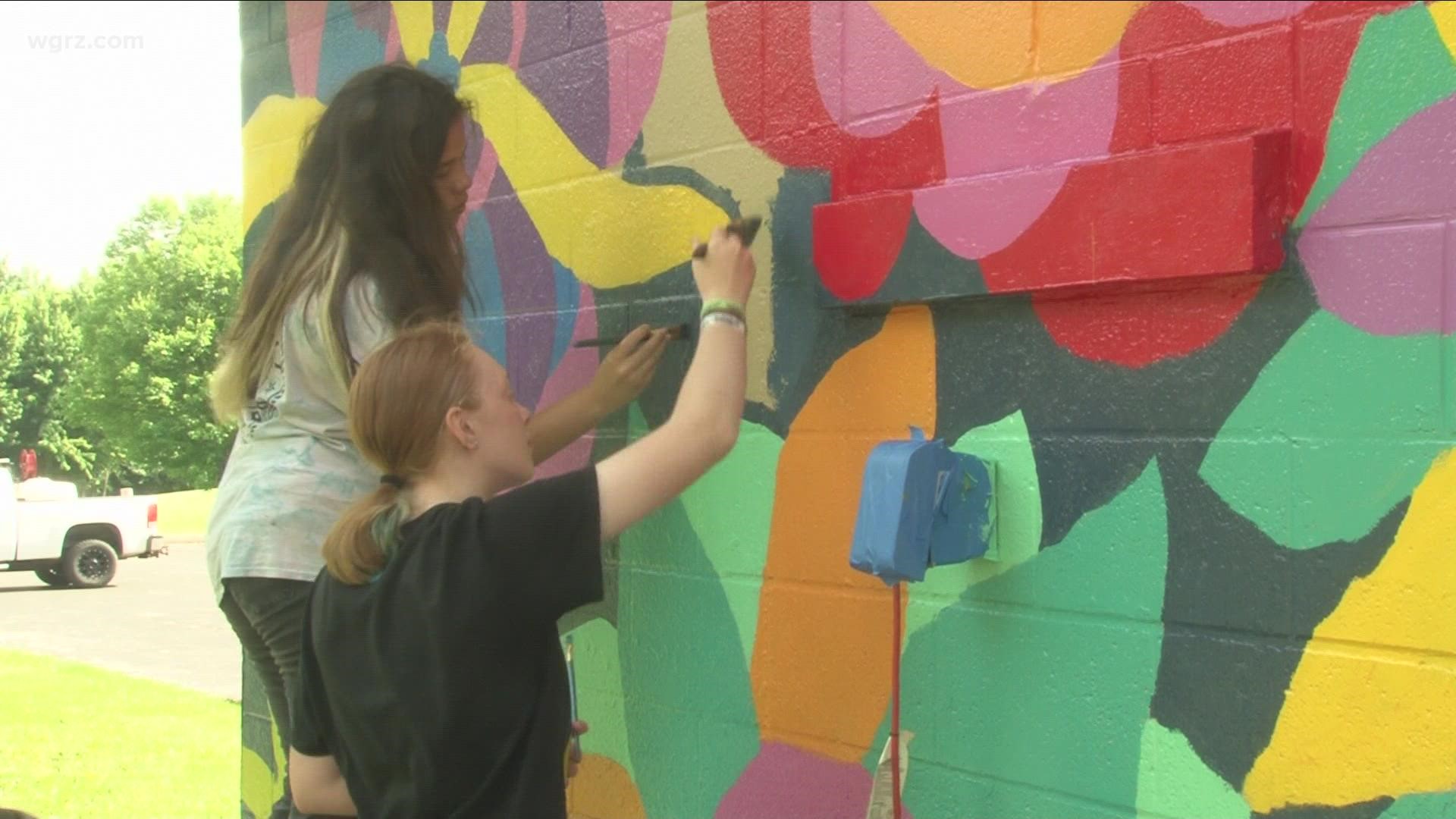 The students spent three days working on their masterpiece, located on a building in Bullard Park in Albion.