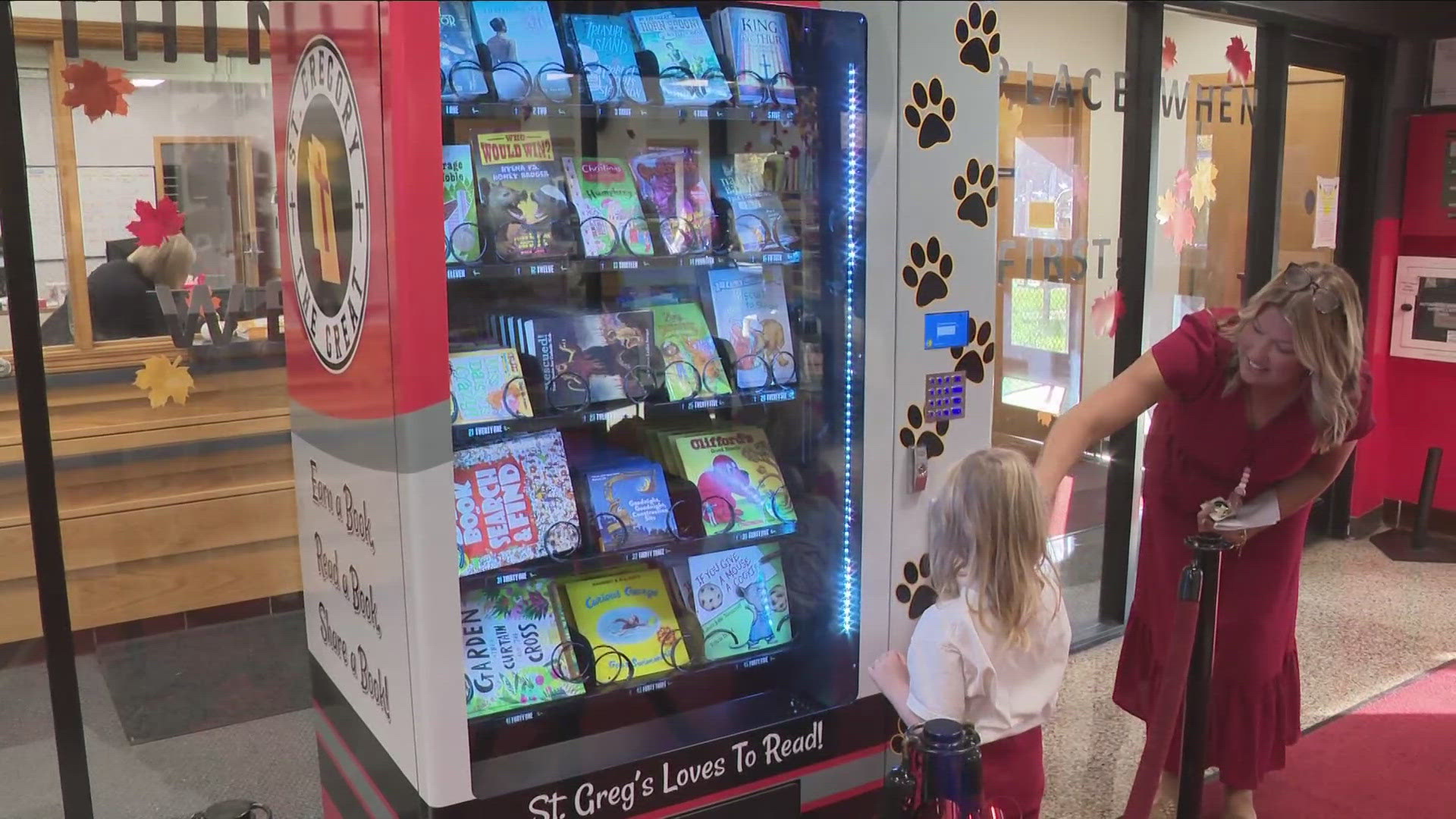 THE INCHY BOOKWORM VENDING MACHINE WAS UNVEILED TODAY AT SAINT GREGORY THE GREAT ELEMENTARY SCHOOL IN WILLIAMSVILLE.