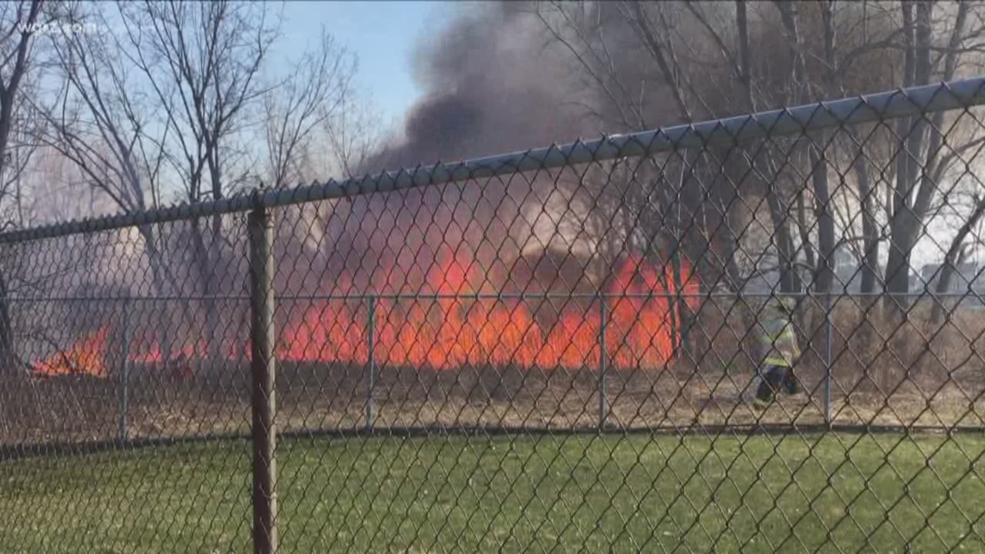 Crews were called to a large brush fire near the airport Monday.