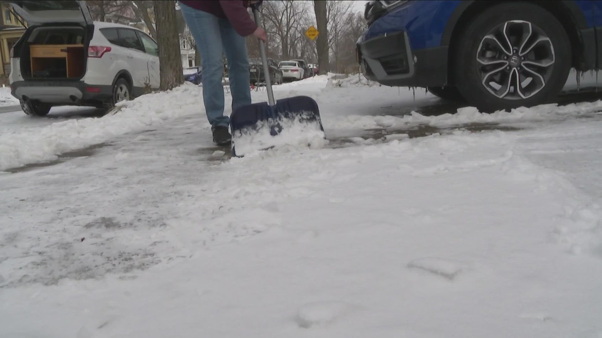 Across the city is a similar sight: downed trees, broken branches, and ice-filled pot holes.