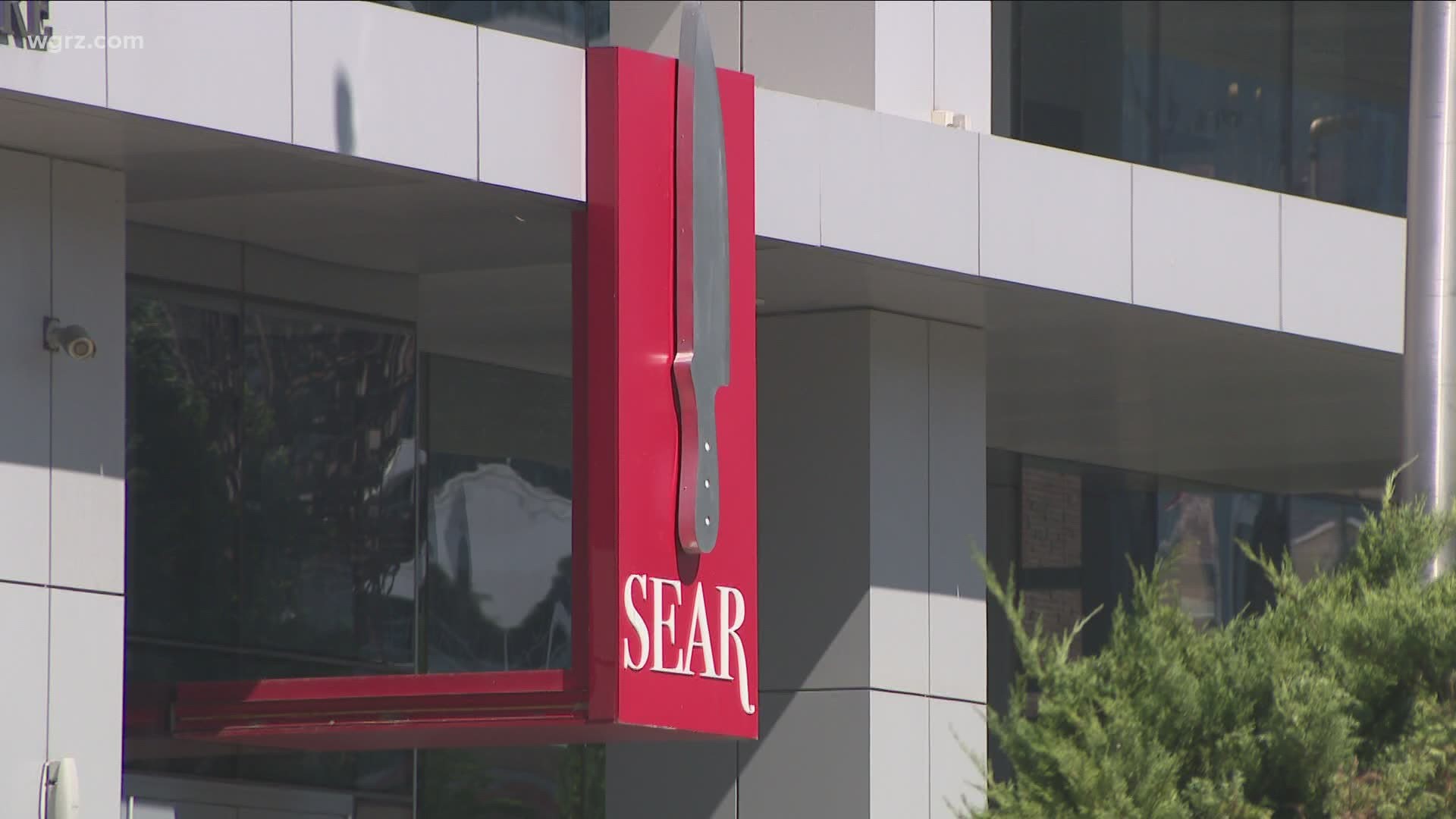 Sear Restaurant in the Avant Building is accusing Uniland Development Co., which owns the building, of a 'litany of bad business dealings.'