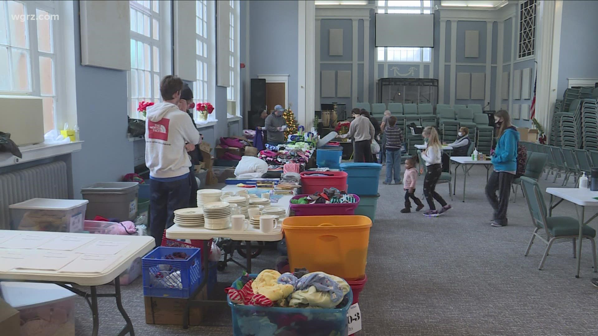 Volunteers with Boxes of Love gave away food, toys and clothing.