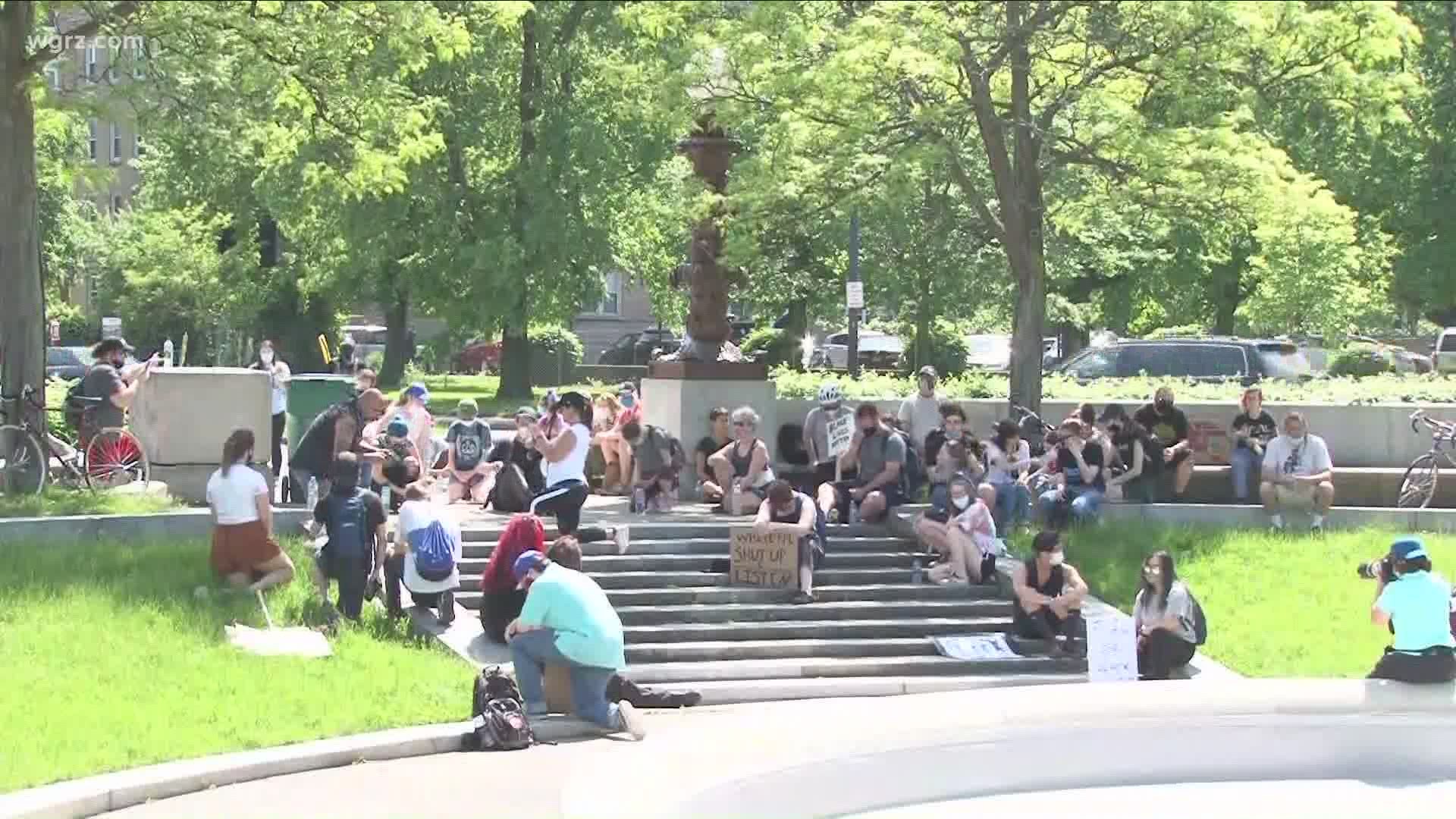 Silent Protesters gather at Gates Circle