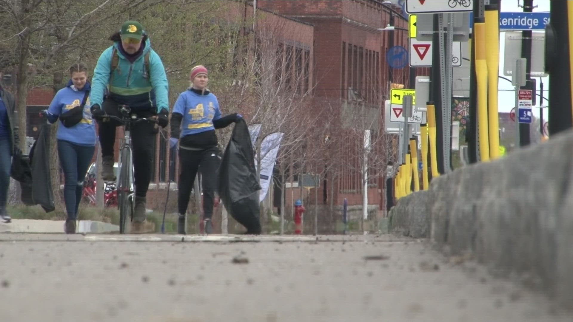 Cyclists picked up trash and debris along the Niagara Street bike trail. Volunteers said the path is often littered with glass and debris.