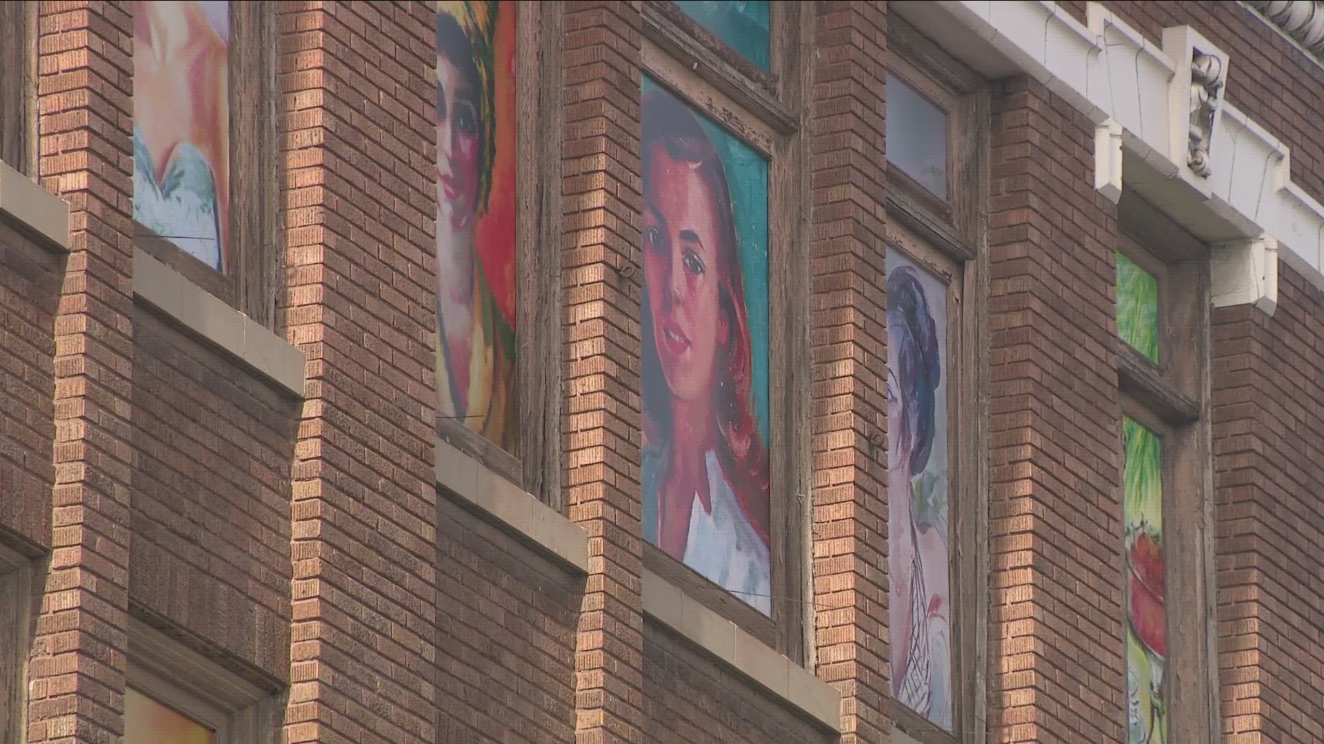 184 portraits painted on Jenss Department Store on Main Street