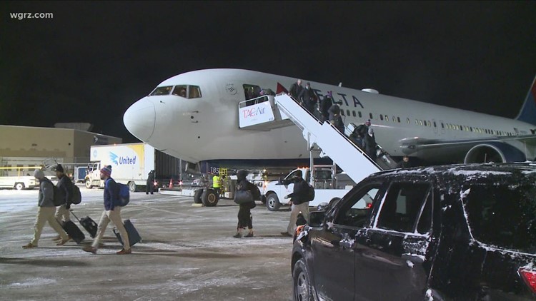 Buffalo Bills fans greet team at airport after heartbreaking overtime loss in Kansas City