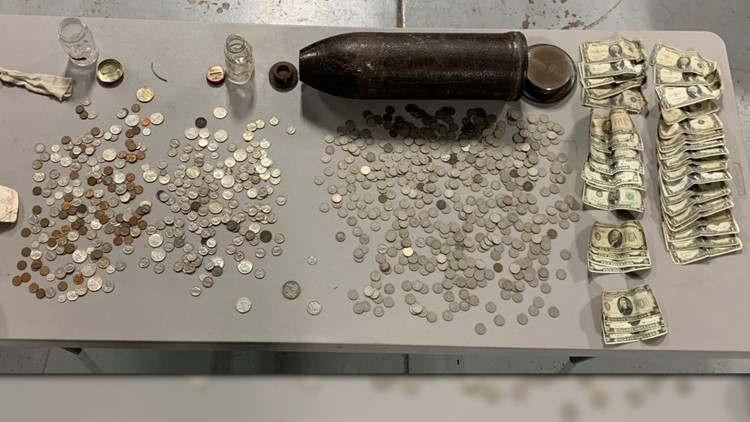 TORPEDO TREASURE:  Coins from the 1800s found inside WWI bomb at Michigan home